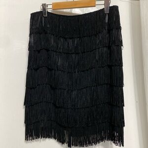 Nanette Lepore fringe, burlesque’s short black skirt! Size 6